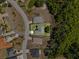 An aerial view highlighting the property's layout, surrounding landscape, and neighborhood at 4502 Fairway Oaks Dr, Mulberry, FL 33860