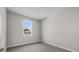 Bedroom featuring plush carpeting and a window with natural light at 4502 Fairway Oaks Dr, Mulberry, FL 33860
