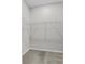 Walk-in closet featuring wire shelving and plush carpeting at 4502 Fairway Oaks Dr, Mulberry, FL 33860