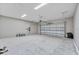 Spacious garage with ample room for vehicles and storage, providing convenience and security at 4502 Fairway Oaks Dr, Mulberry, FL 33860