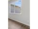Bright room with lots of natural light, showcasing the nice window and luxury vinyl flooring at 4502 Fairway Oaks Dr, Mulberry, FL 33860