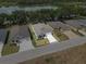 Aerial view of home showing backyard, lawn, and surrounding neighborhood at 4537 Fairway Oaks Dr, Mulberry, FL 33860