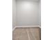 Empty closet with neutral carpet and white trim at 4537 Fairway Oaks Dr, Mulberry, FL 33860