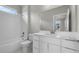 Bathroom featuring white vanity, tile backsplash, and a toilet at 4541 Fairway Oaks Dr, Mulberry, FL 33860