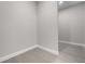 A carpeted walk-in closet ready for plenty of storage space at 4541 Fairway Oaks Dr, Mulberry, FL 33860