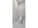 A half bath featuring a toilet and tile flooring at 4541 Fairway Oaks Dr, Mulberry, FL 33860