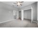 Bedroom featuring carpeted floor, closet and ensuite bathroom at 4545 Fairway Oaks Dr, Mulberry, FL 33860