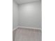 This carpeted walk-in closet is ready for you to organize your clothes! at 4545 Fairway Oaks Dr, Mulberry, FL 33860