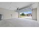 Spacious, unfinished two-car garage offering endless possibilities at 4545 Fairway Oaks Dr, Mulberry, FL 33860