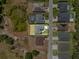 Overhead view of the home nestled within a residential community at 4550 Fairway Oaks Dr, Mulberry, FL 33860
