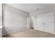 Spacious bedroom featuring neutral carpet, double door closet and ensuite bathroom at 4550 Fairway Oaks Dr, Mulberry, FL 33860