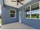 Covered patio with painted walls, recessed lighting, windows and backyard views at 4550 Fairway Oaks Dr, Mulberry, FL 33860