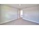 An empty bedroom with neutral walls and carpet at 4646 Grandview Glen Dr, Auburndale, FL 33823
