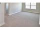 Bright bedroom with carpet, connecting to other rooms and providing ample space at 4646 Grandview Glen Dr, Auburndale, FL 33823