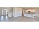 Open-concept living space showcases a modern kitchen with a large island at 4646 Grandview Glen Dr, Auburndale, FL 33823