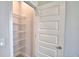 Pantry with metal shelving for kitchen storage at 4646 Grandview Glen Dr, Auburndale, FL 33823