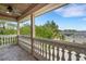 Exterior balcony area with view to trees and beautiful blue skies at 6487 Ashley Dr, Lakeland, FL 33813