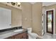 Bathroom features include granite vanity, commode, large mirror and glass enclosed shower stall at 6487 Ashley Dr, Lakeland, FL 33813