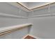 Walk-in closet provides shelf and rod storage to help maximize organization at 6487 Ashley Dr, Lakeland, FL 33813