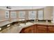Modern kitchen sink with granite countertops, under-cabinet storage, and a bright, airy feel from large windows at 6487 Ashley Dr, Lakeland, FL 33813