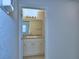 Bright bathroom features white vanity, tiled floor, and modern lighting at 1484 Leamington Ln, Winter Haven, FL 33884