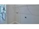 A laundry room with lots of space and adjacent to the kitchen at 1484 Leamington Ln, Winter Haven, FL 33884
