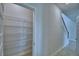 Walk-in pantry featuring sturdy wire shelving for optimized storage and organization at 1484 Leamington Ln, Winter Haven, FL 33884