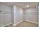 Large walk-in closet with carpet flooring and metal shelving at 1484 Leamington Ln, Winter Haven, FL 33884