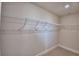 Organized walk-in closet featuring wire shelving for ample storage space and efficient organization at 4670 Grandview Glen Dr, Auburndale, FL 33823