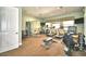 Bright exercise room featuring treadmills, weight machines, and free weights for a complete workout at 4670 Grandview Glen Dr, Auburndale, FL 33823