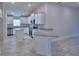 Modern kitchen showcasing granite countertops, stainless steel appliances, and ample white cabinetry at 4670 Grandview Glen Dr, Auburndale, FL 33823