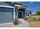 Beautiful home with a two car garage, stone driveway and a beautiful entrance at 4938 Vue Delac Pass, Auburndale, FL 33823