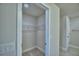 Walk-in closet with wire shelving and carpet at 4938 Vue Delac Pass, Auburndale, FL 33823