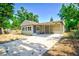 Cozy single-story home with a convenient carport, freshly painted exterior, and sunny curb appeal at 318 Senate St, Auburndale, FL 33823