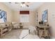 Comfortable home office with a desk, chair, and bookshelves, providing a functional and stylish workspace at 8288 Lake James Dr, Lakeland, FL 33810