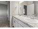 Elegant bathroom showcasing double sinks, large mirrors, and ample counter space at 2101 Summerlake Dr, Auburndale, FL 33823