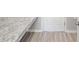 Corner of kitchen counter showing hardwood floors at 2101 Summerlake Dr, Auburndale, FL 33823