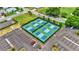 Aerial shot of neighborhood pickleball courts, ample parking, and surrounding greenery at 5879 Swallow Dr, Lakeland, FL 33809