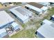 Mobile home with shed and golf cart visible at 6734 Kensington Ne Dr, Winter Haven, FL 33881