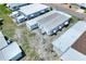 Aerial view showing mobile home and shed at 6734 Kensington Ne Dr, Winter Haven, FL 33881