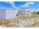 Property boasts a spacious backyard with shed at 6734 Kensington Ne Dr, Winter Haven, FL 33881