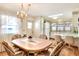 Bright dining area with a table and chairs, ready for Gathering meals at 6734 Kensington Ne Dr, Winter Haven, FL 33881