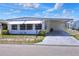Charming mobile home with carport and awning at 6734 Kensington Ne Dr, Winter Haven, FL 33881