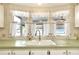 Clean kitchen sink with a window overlooking the backyard at 6734 Kensington Ne Dr, Winter Haven, FL 33881