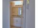 Bathroom with a granite countertop, white cabinetry, and brushed nickel hardware at 4676 Grandview Glen Dr, Auburndale, FL 33823