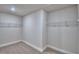 Walk-in closet features wire shelving and neutral carpeting at 4676 Grandview Glen Dr, Auburndale, FL 33823