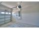 Bright garage with door and hardware, electrical box, and clean floors at 4676 Grandview Glen Dr, Auburndale, FL 33823
