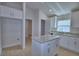 Stylish kitchen featuring granite countertops, island, and ample cabinet space at 4687 Grandview Glen Dr, Auburndale, FL 33823