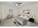 Bedroom featuring neutral decor and staged furniture at 1144 Waterfall Ln # 26, Lakeland, FL 33803