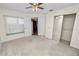 Bedroom with window seat and mirrored closet at 1144 Waterfall Ln # 26, Lakeland, FL 33803